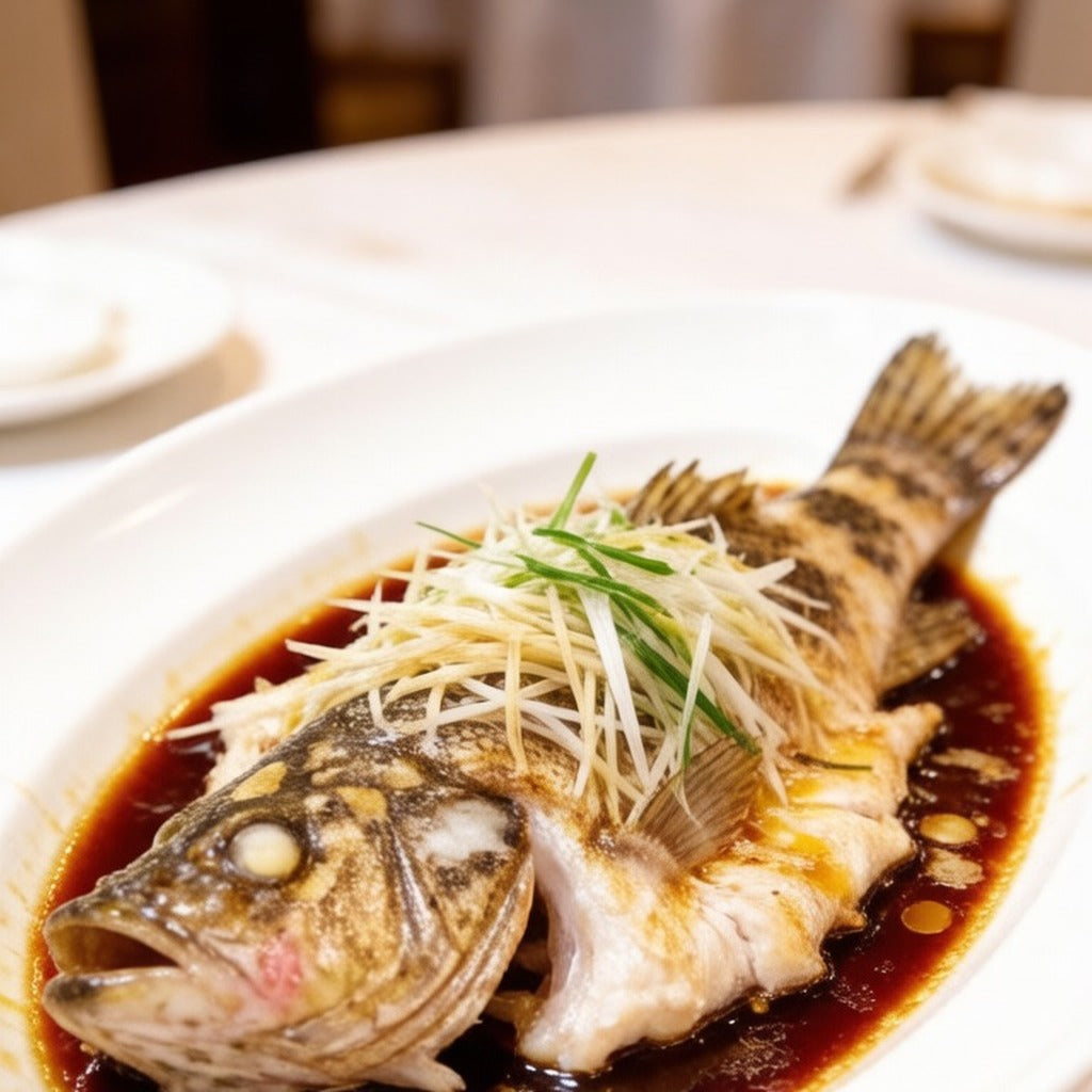 Steamed whole grouper dressed with ginger, scallion and soy